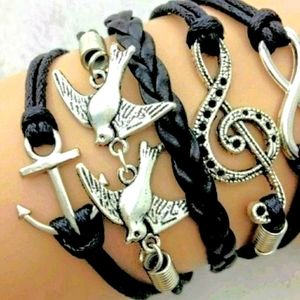 Multi-Strand Multi-Charm Cord Bracelet